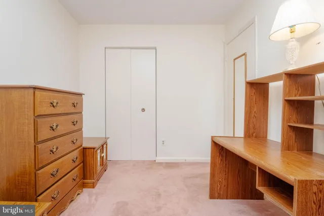 a view of a house with a yard and deck