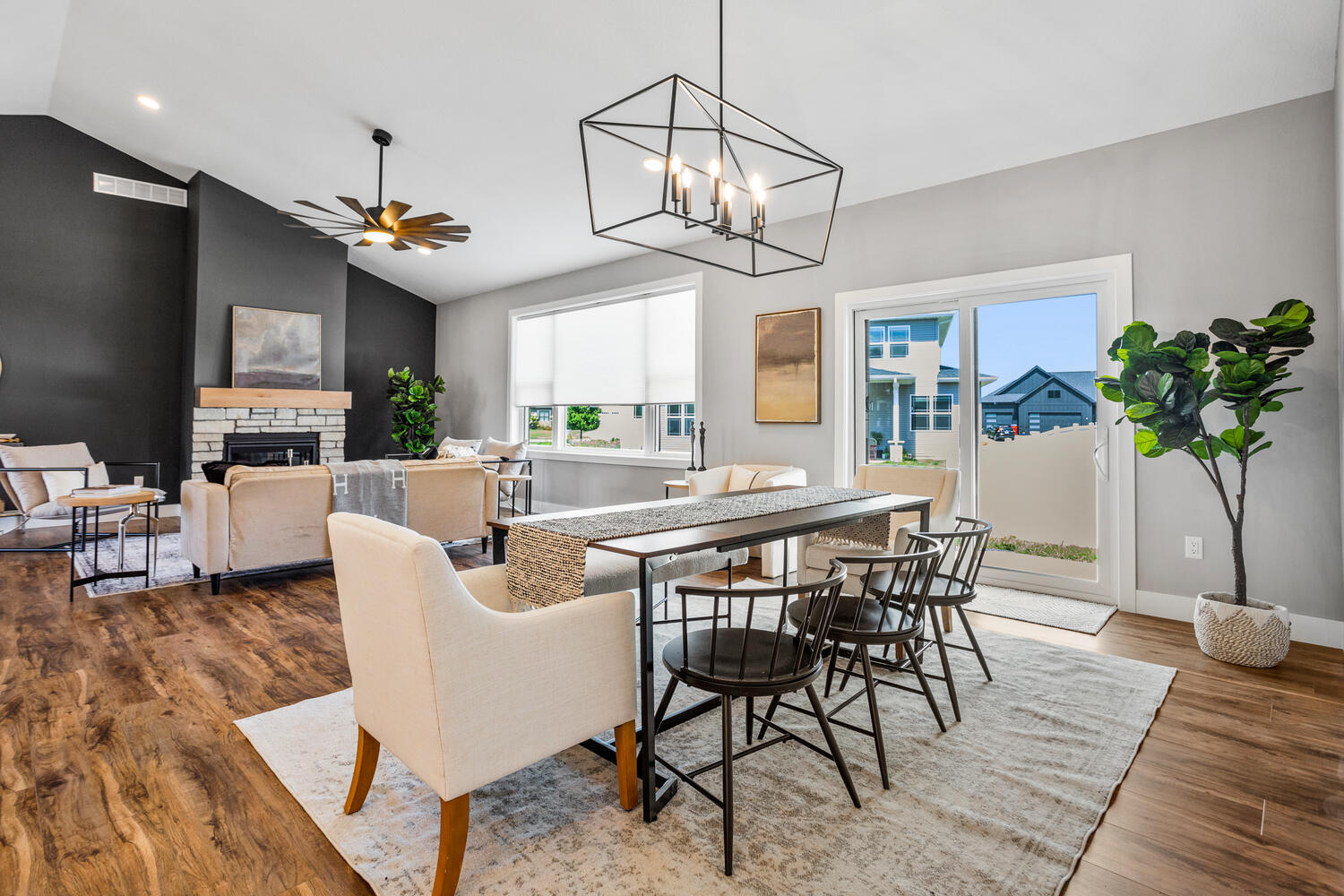 5016 Trey Boulevard Champaign, IL 61822 - Photo 13 of 38 a view of a dining room with furniture a chandelier and wooden floor