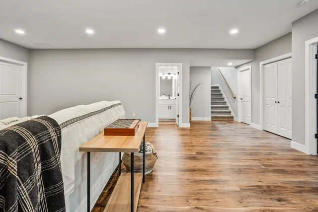a room with furniture and wooden floor