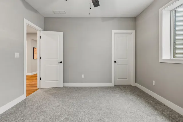 an empty room with windows