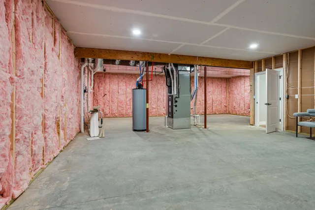 a view of an empty room with a fireplace