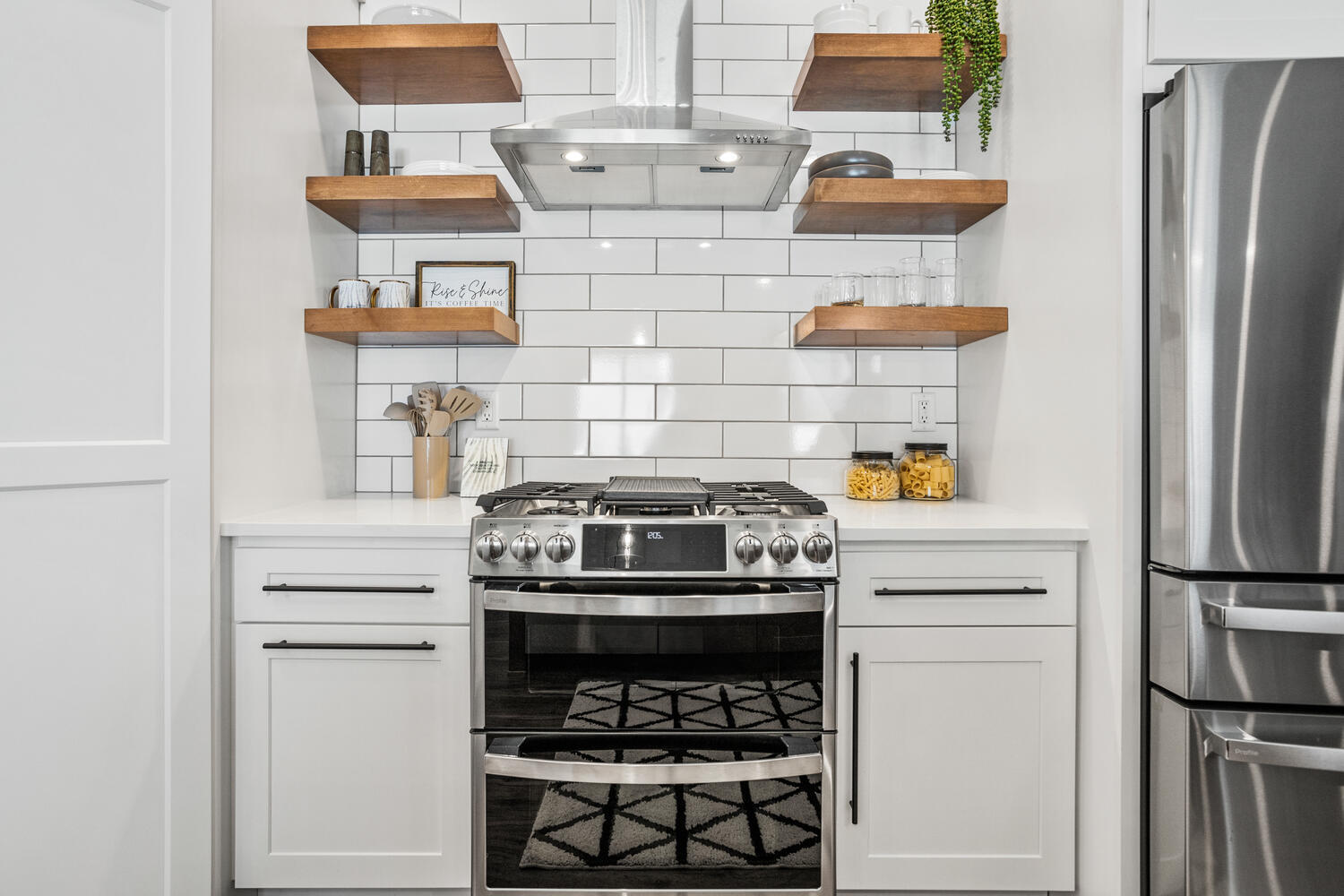 5016 Trey Boulevard Champaign, IL 61822 - Photo 9 of 38 a white stove top oven sitting inside of a kitchen