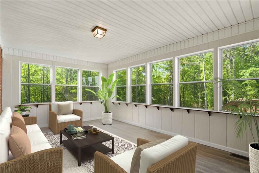 314 Coady Road Jackson, GA 30233 - Photo 25 of 31 a living room with furniture and a window