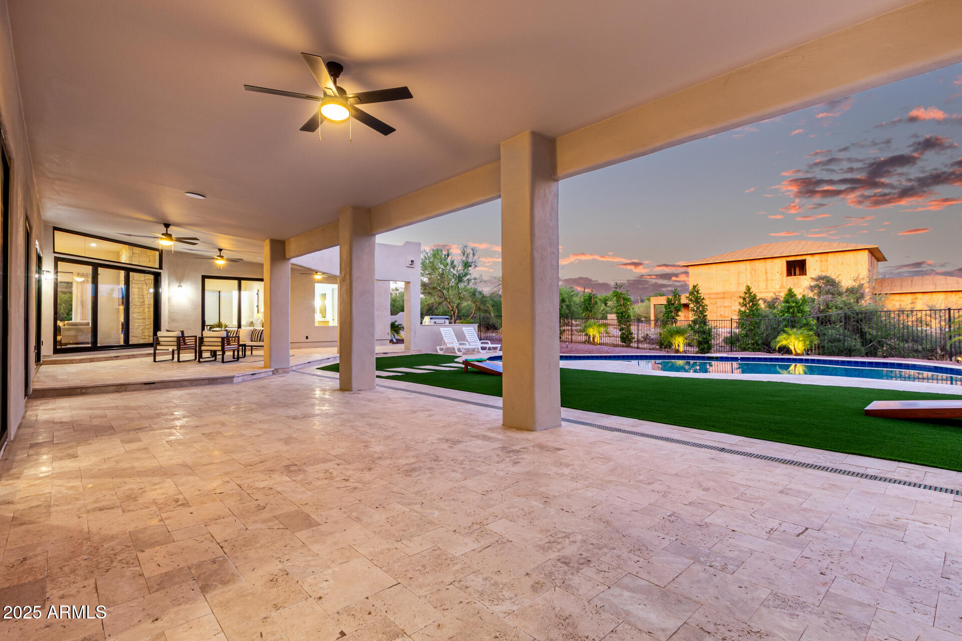 6735 East Dove Valley Road Cave Creek, AZ 85331 - Photo 42 of 58 a view of a patio with a yard