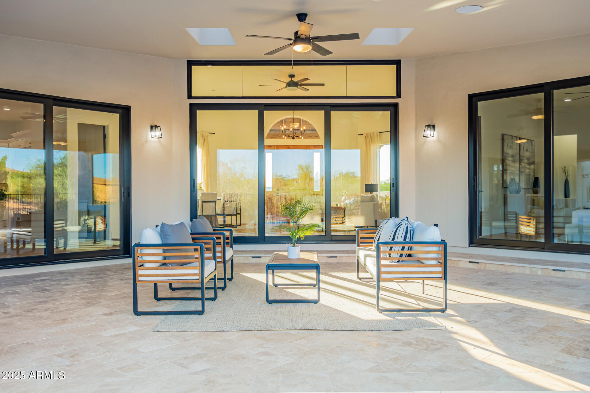 6735 East Dove Valley Road Cave Creek, AZ 85331 - Photo 52 of 58 a living room with furniture and a large window
