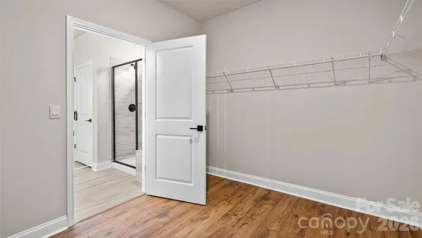 a view of small space with wooden floor