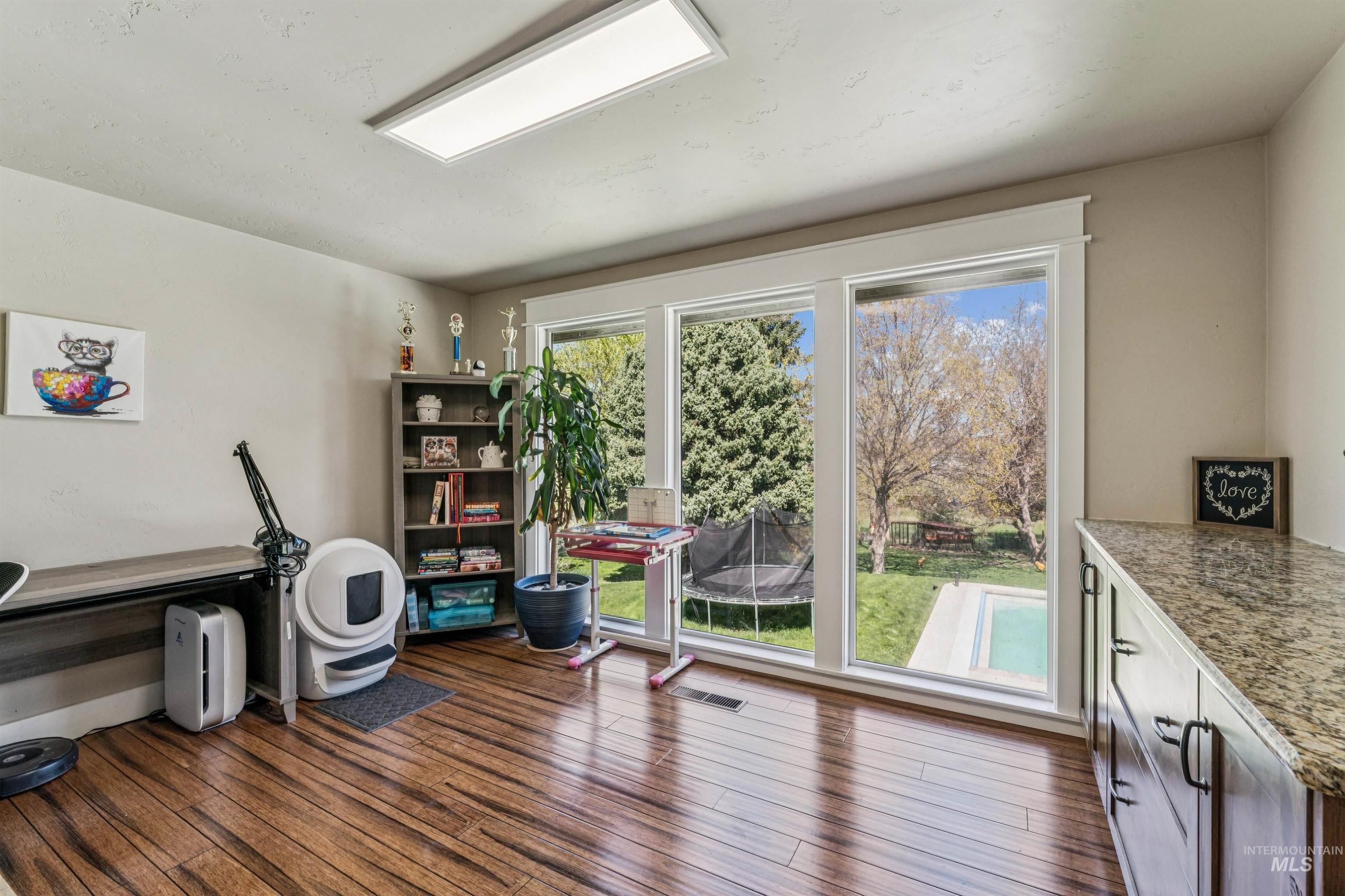 1050 West South Slope Road Emmett, ID 83617 - Photo 20 of 49 Misc room with dark wood finished floors