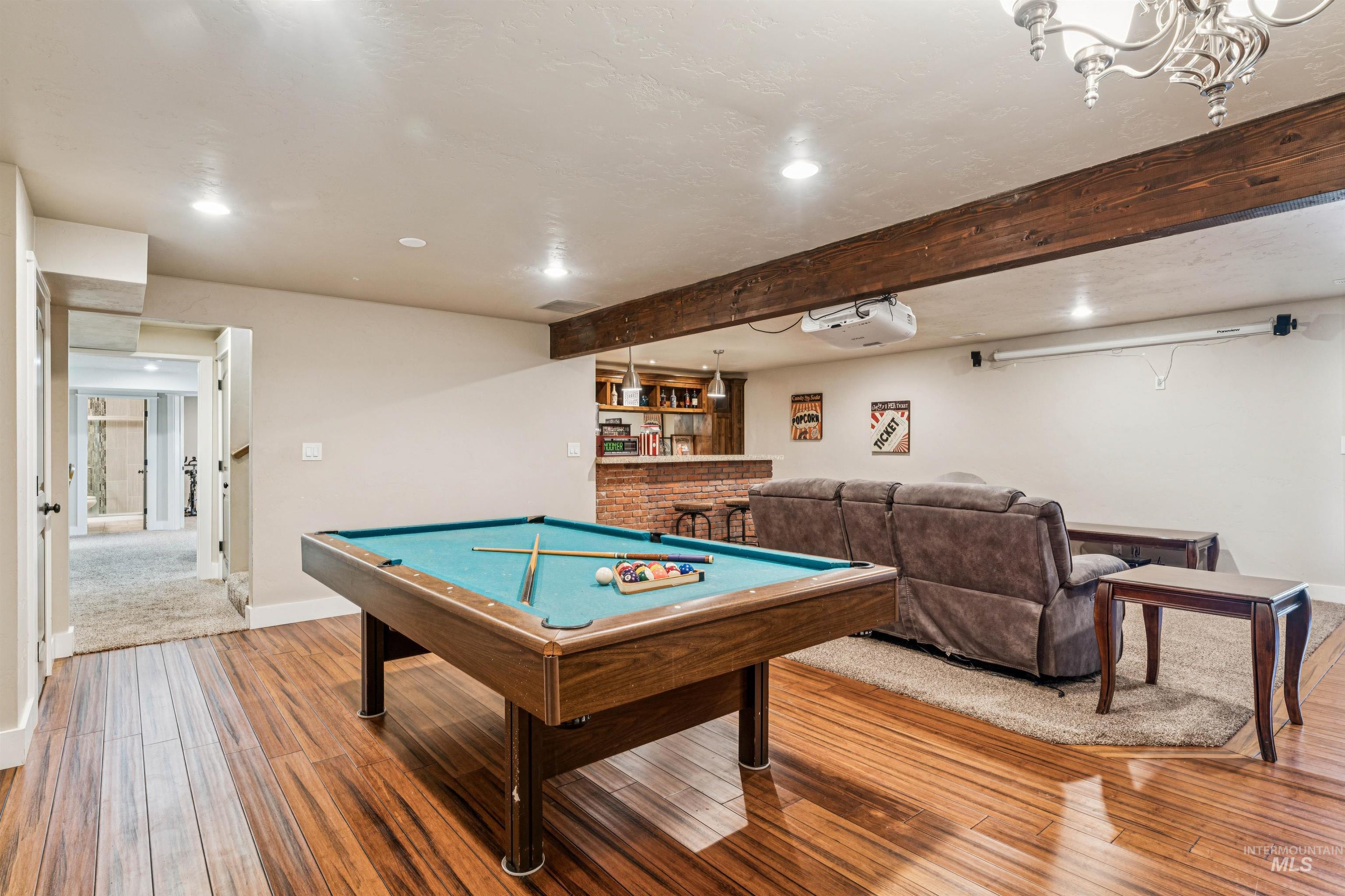 1050 West South Slope Road Emmett, ID 83617 - Photo 27 of 49 Rec room with recessed lighting, billiards table, hardwood / wood-style floors, a bar, and beamed ceiling