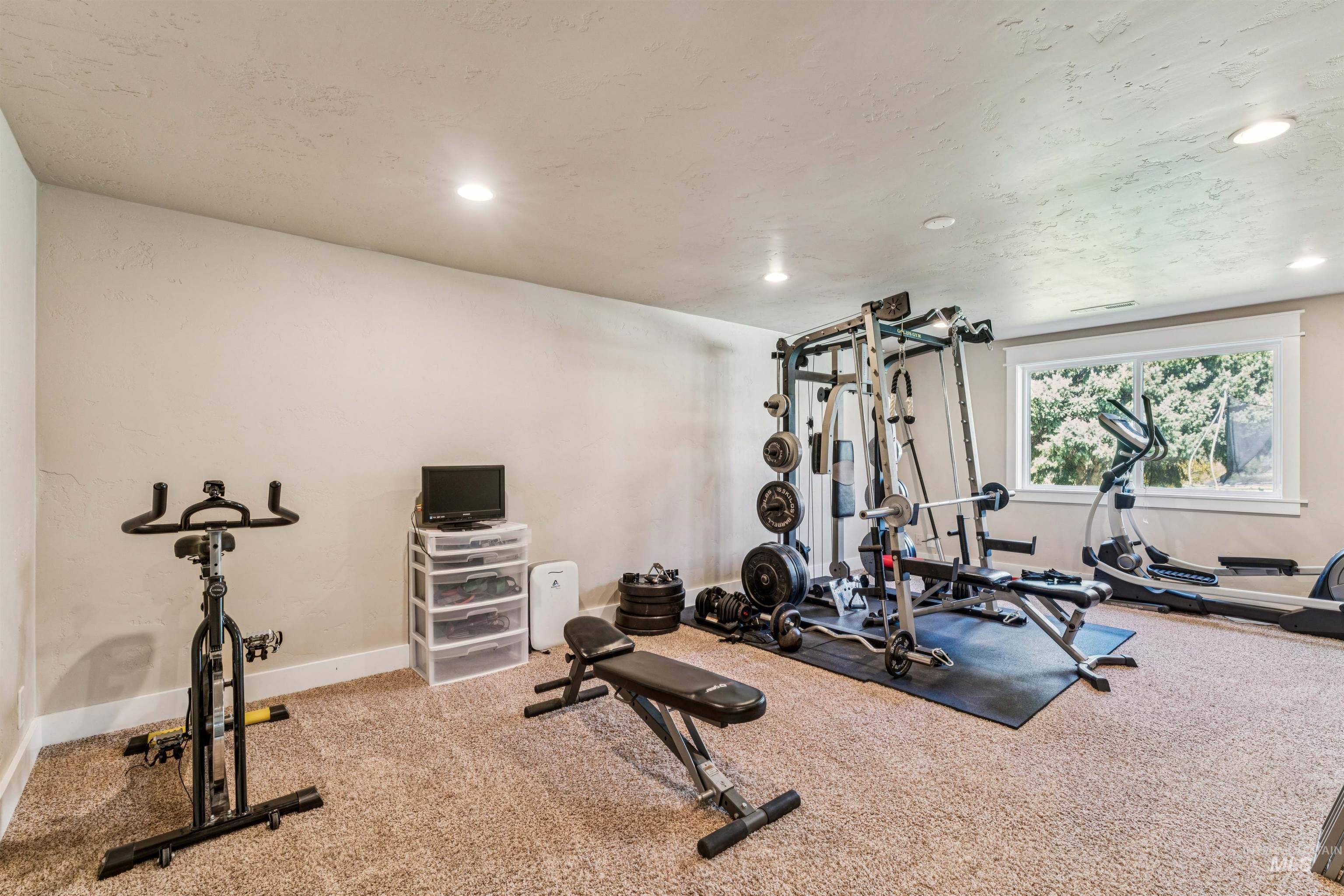 1050 West South Slope Road Emmett, ID 83617 - Photo 32 of 49 Exercise area with carpet and recessed lighting