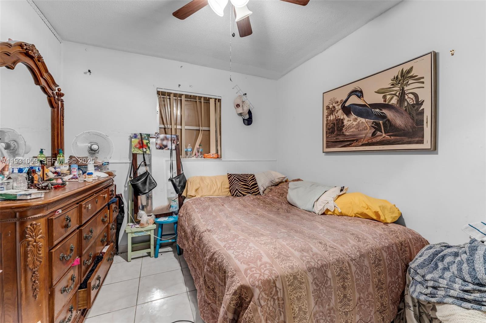 445 Northwest 8th Street Homestead, FL 33030 - Photo 11 of 32 a bedroom with bed and wooden floor