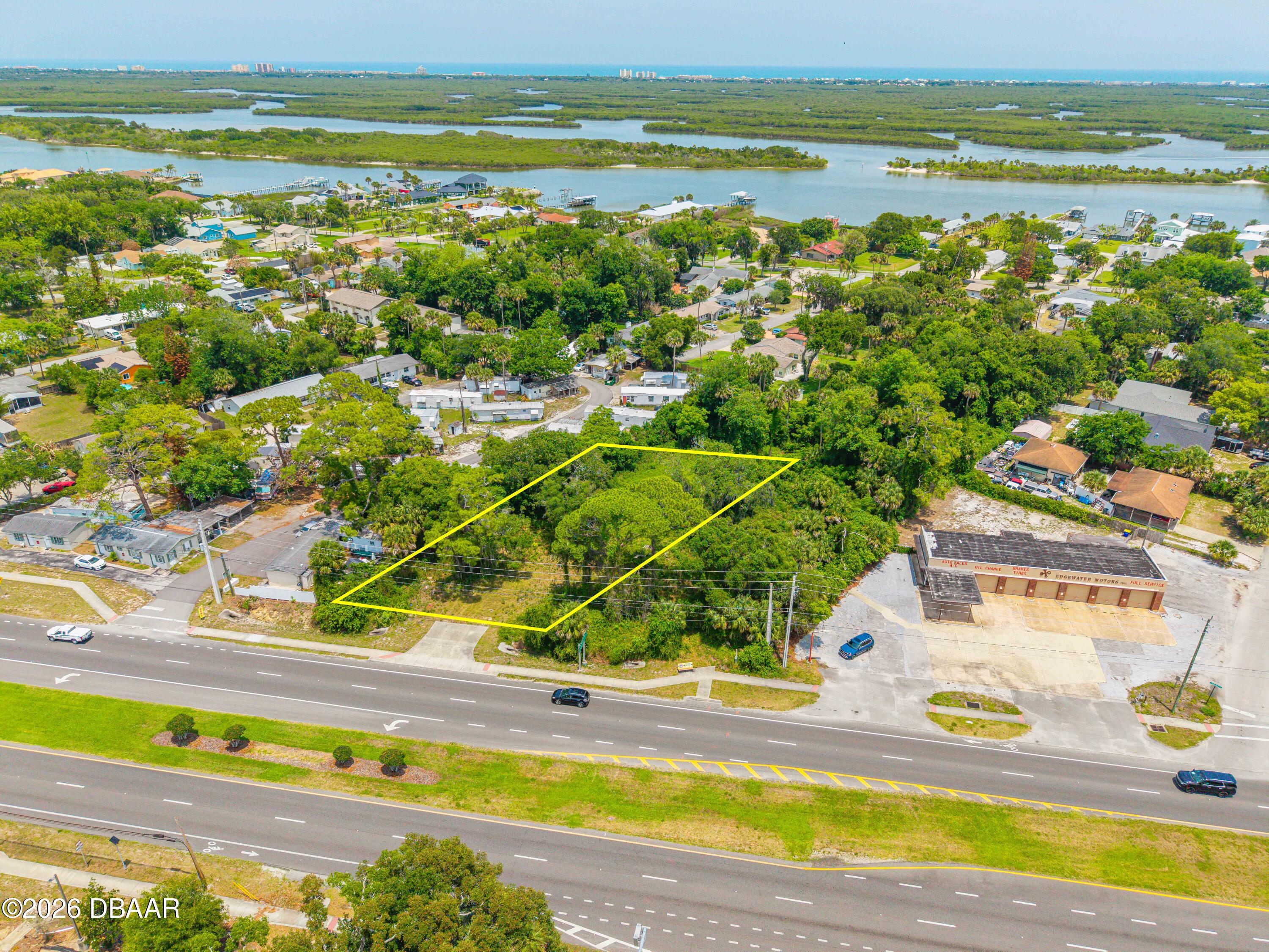 1711 South Ridgewood Avenue Edgewater, FL 32132 - Photo 1 of 10 a view of a city