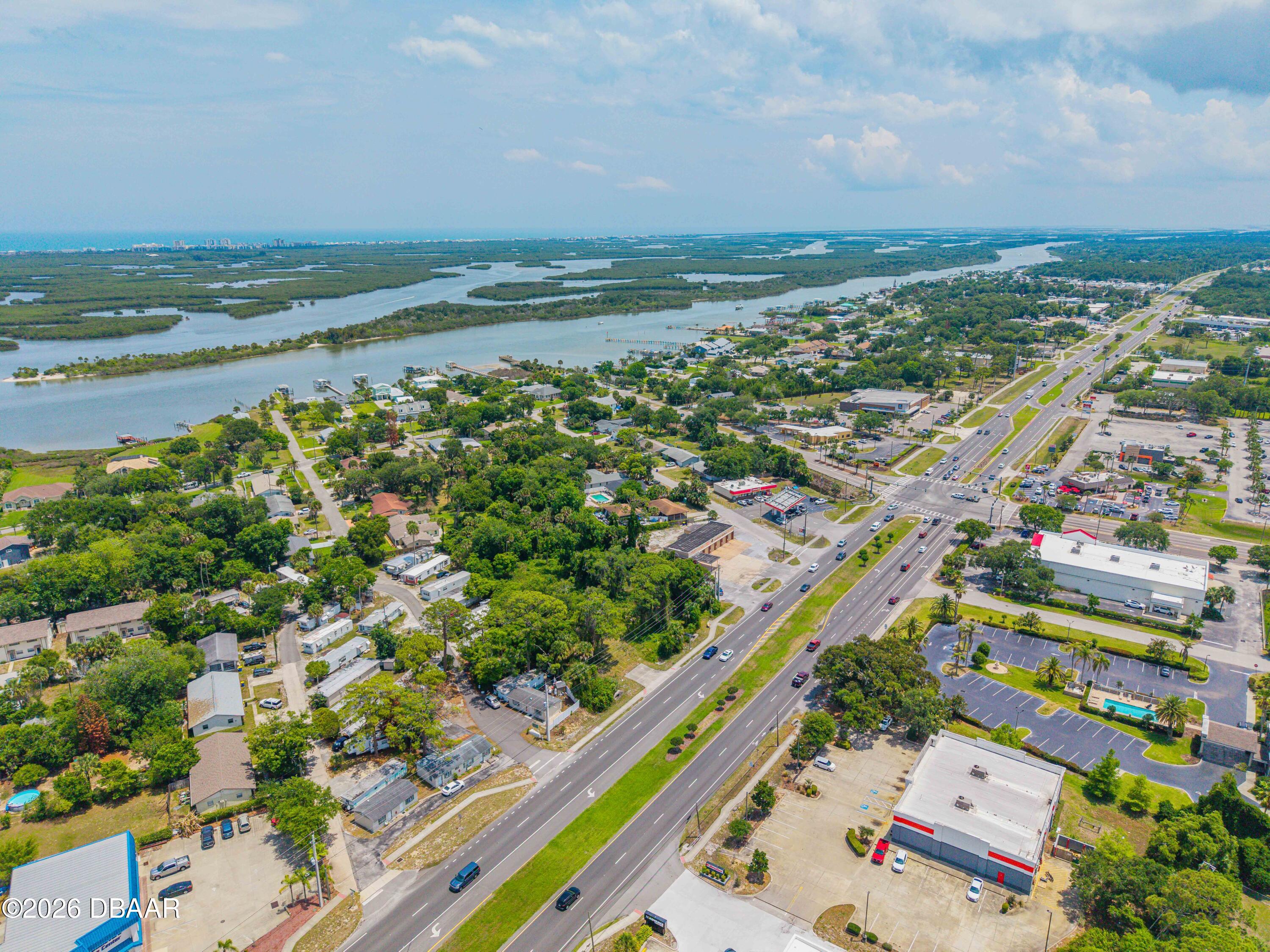 1711 South Ridgewood Avenue Edgewater, FL 32132 - Photo 5 of 10 an aerial view of a city
