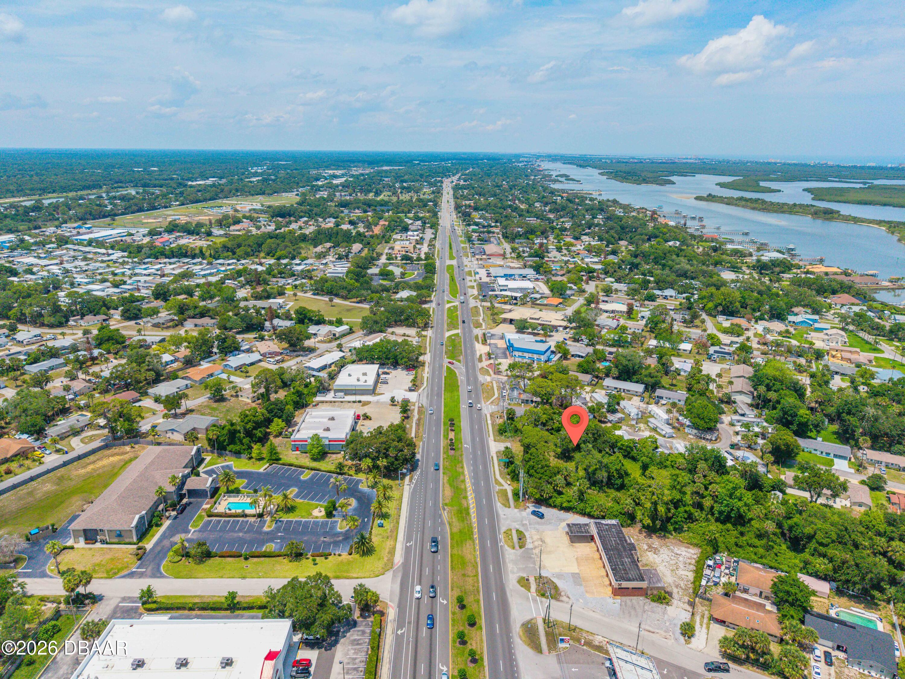 1711 South Ridgewood Avenue Edgewater, FL 32132 - Photo 8 of 10 a view of city and green space