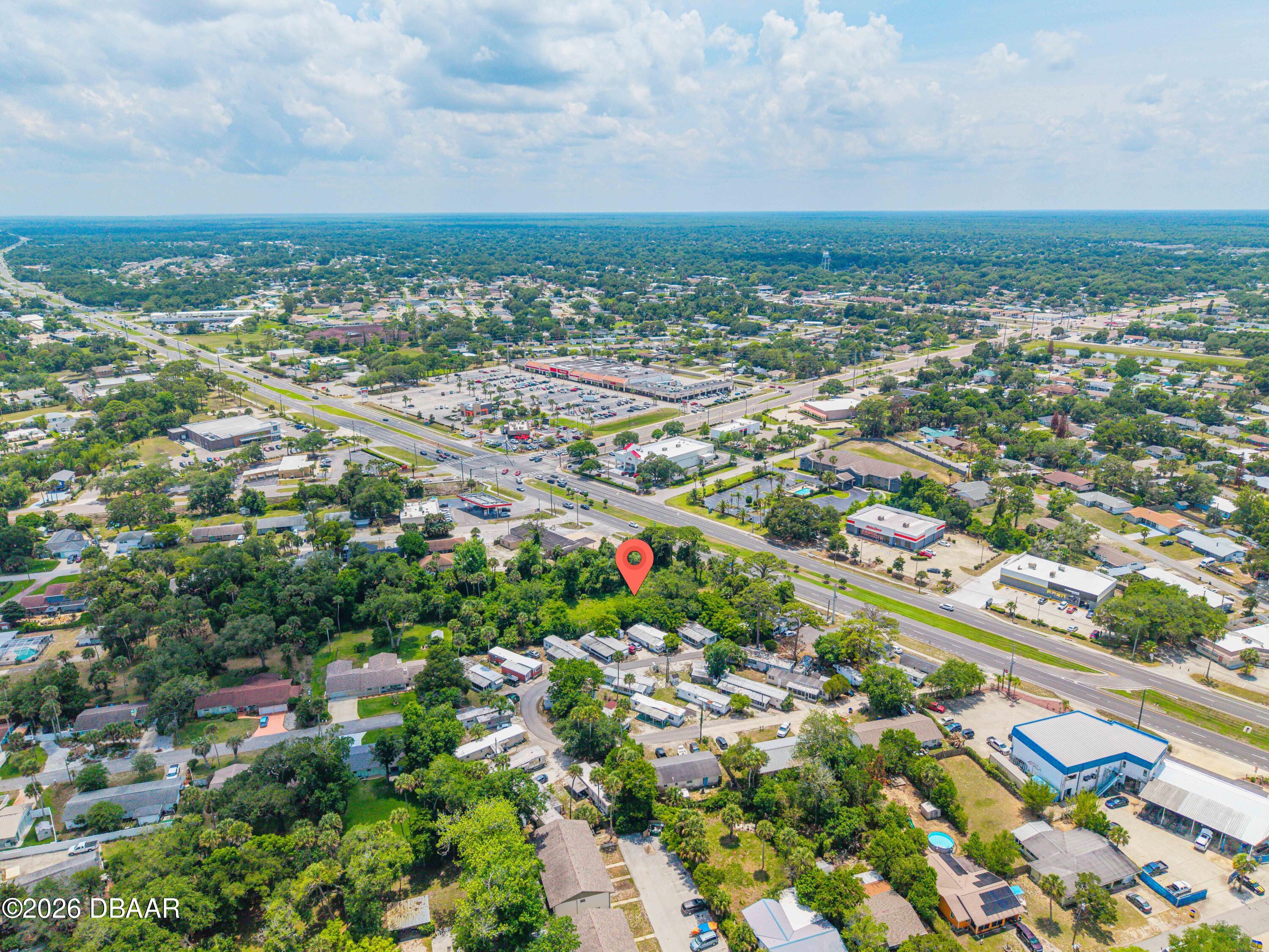 1711 South Ridgewood Avenue Edgewater, FL 32132 - Photo 10 of 10 an aerial view of multiple house