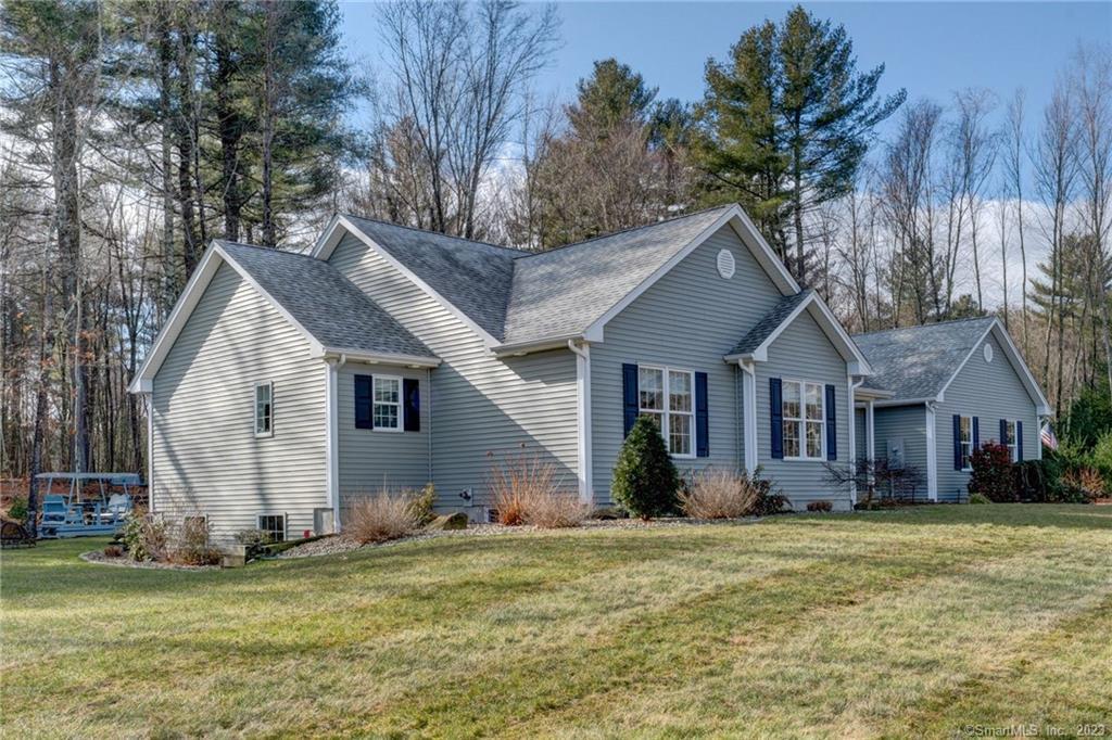 5 Hunters Ridge Columbia, CT 06237 - Photo 1 of 1 a front view of house with yard and green space