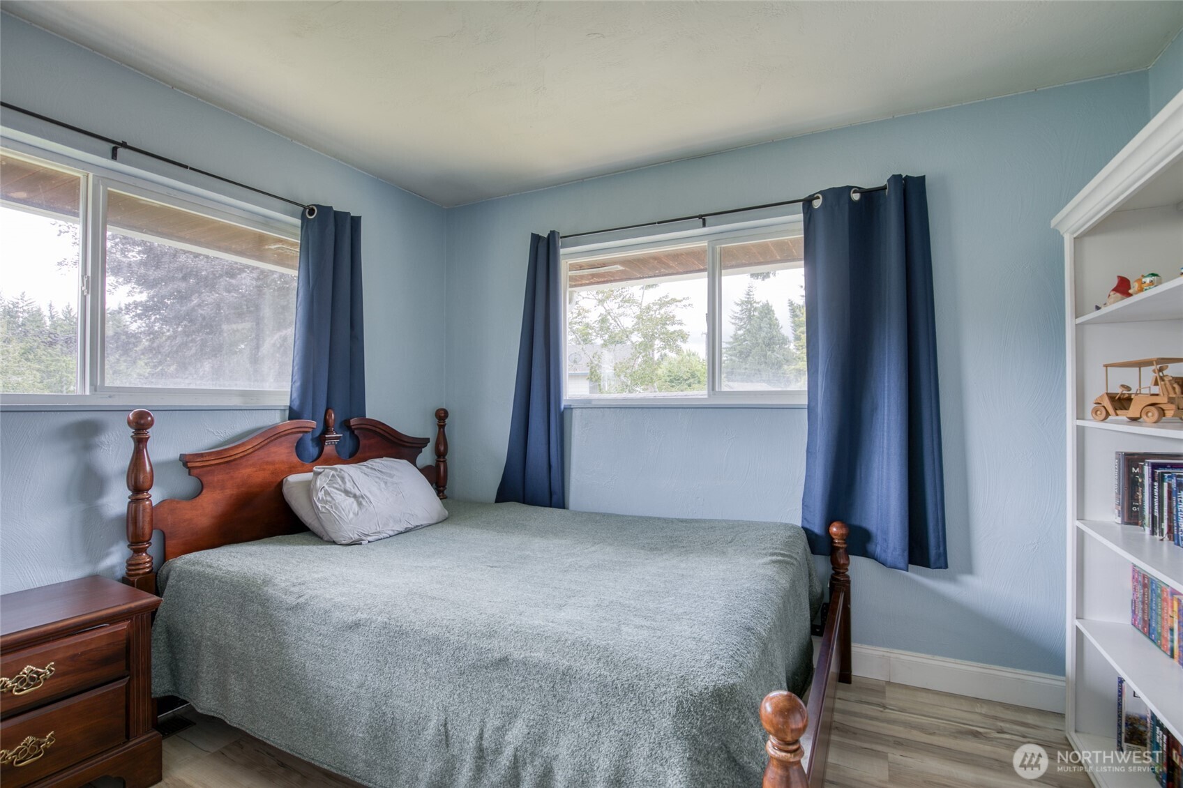 218 Holly Lane Cosmopolis, WA 98537 - Photo 17 of 30 a bedroom with a bed and a window