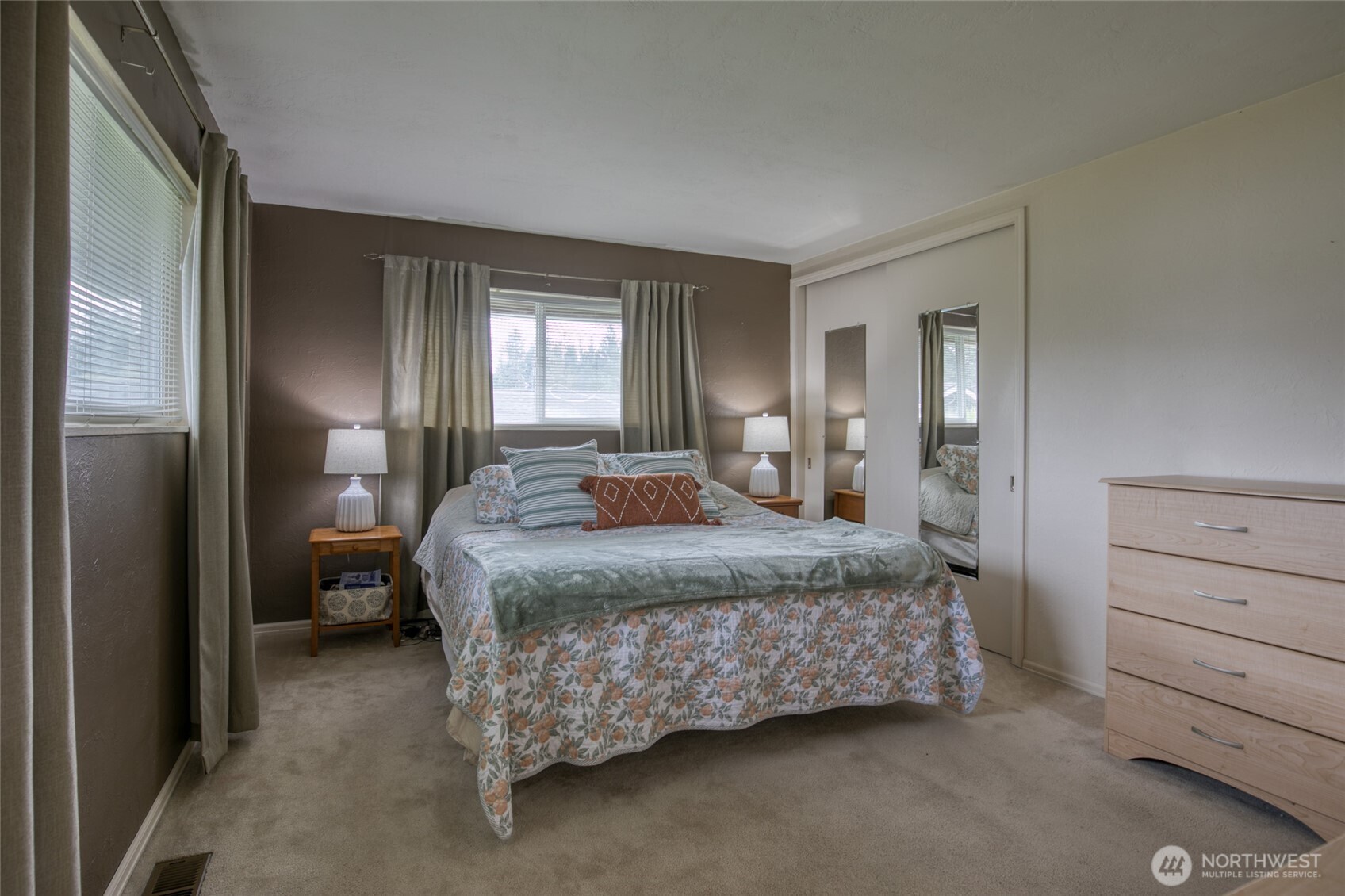 218 Holly Lane Cosmopolis, WA 98537 - Photo 25 of 30 a bedroom with a bed and a dresser