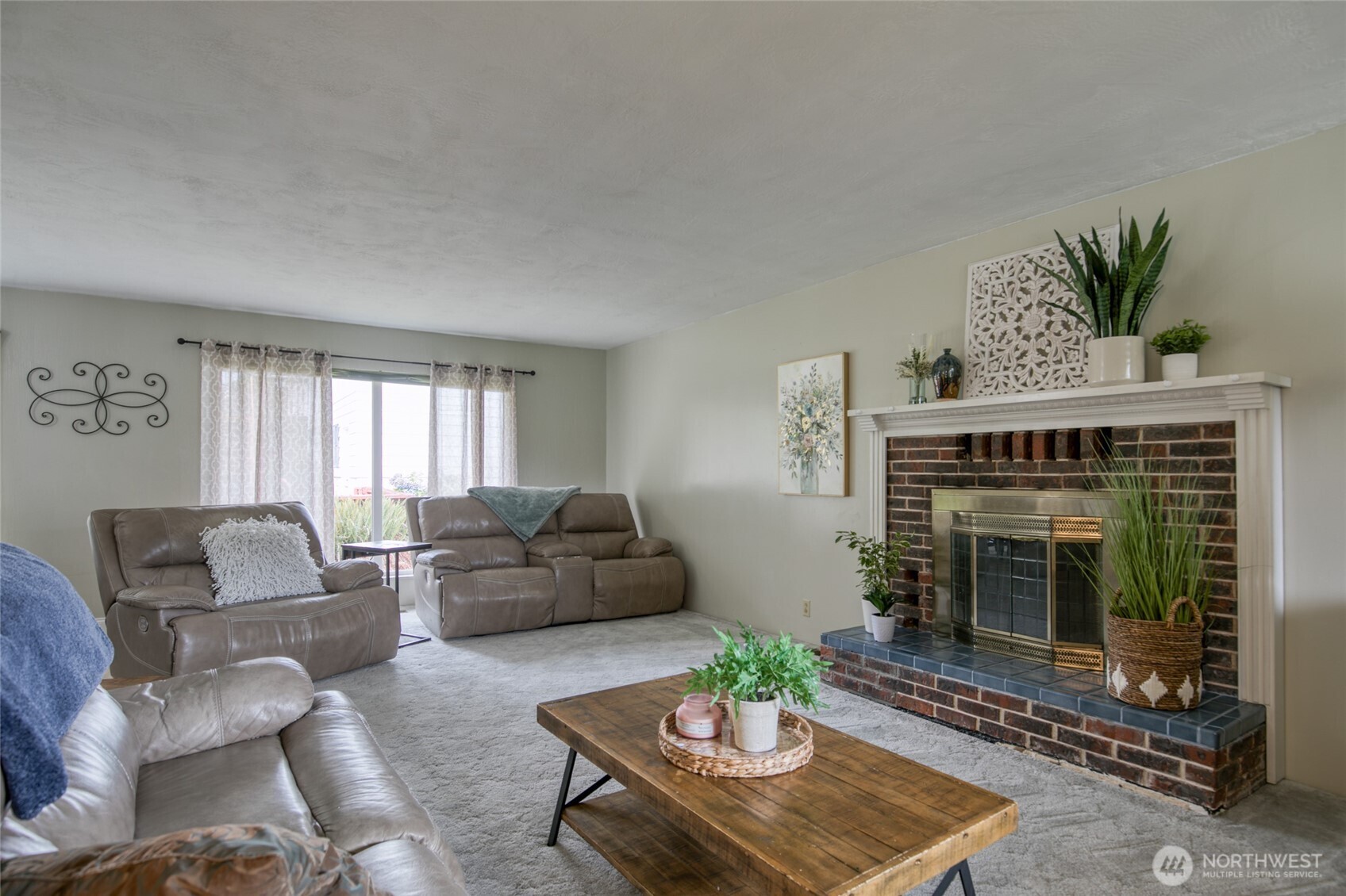 218 Holly Lane Cosmopolis, WA 98537 - Photo 7 of 30 a living room with furniture and a fireplace