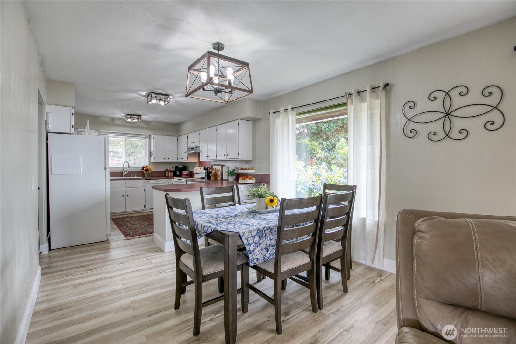 218 Holly Lane Cosmopolis, WA 98537 - Photo 9 of 30 a view of a dining room with furniture window and wooden floor