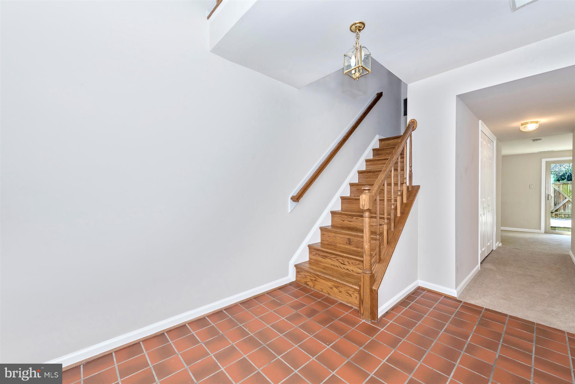 8023 Broken Reed Court Frederick, MD 21701 - Photo 3 of 25 Foyer leads to the upstairs or family room