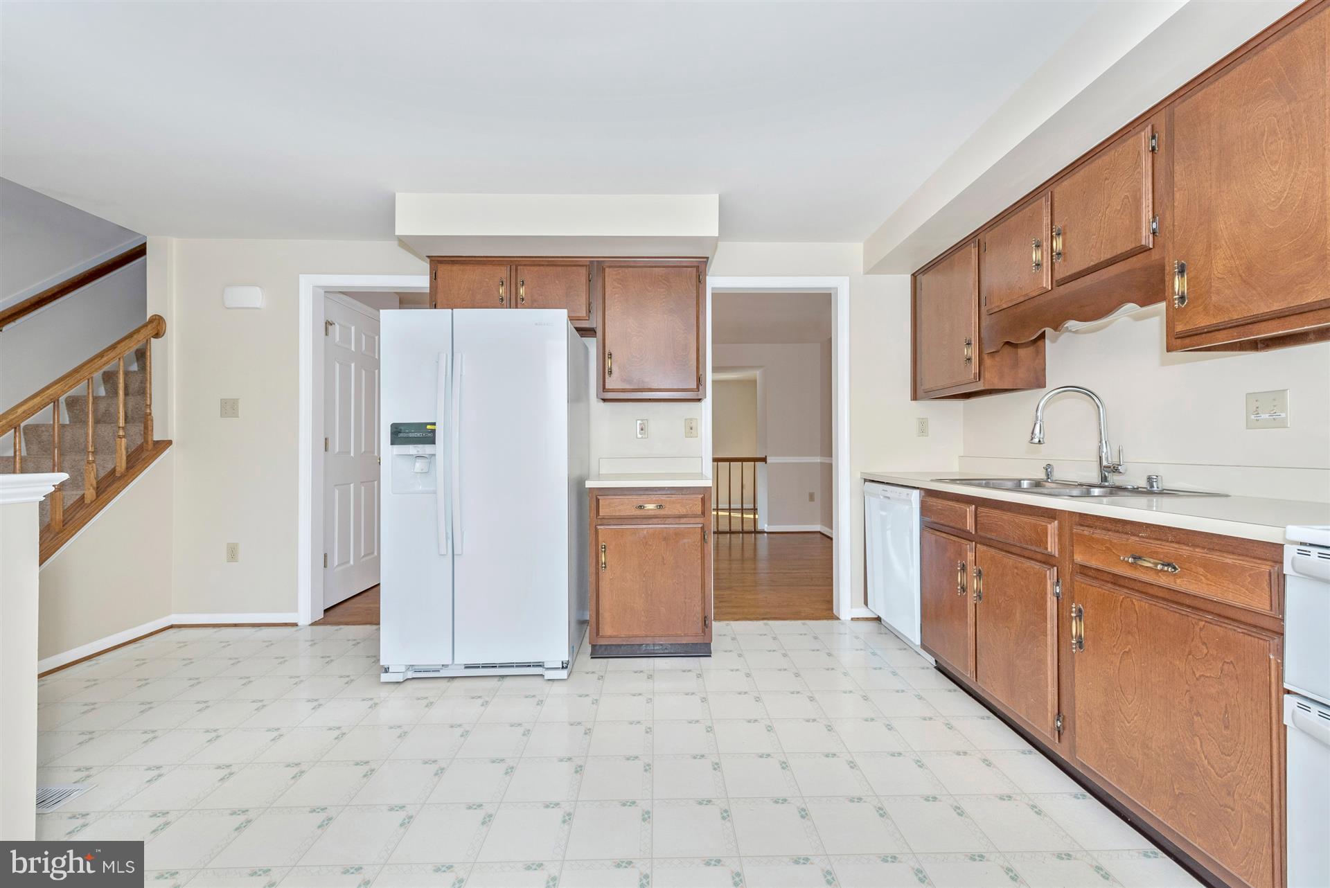 8023 Broken Reed Court Frederick, MD 21701 - Photo 8 of 25 Kitchen view leading to dining & living rooms.