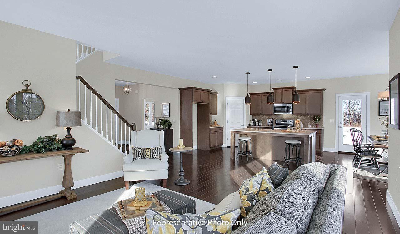 164 East Valley Road Denver, PA 17517 - Photo 14 of 23 a living room with furniture and a wooden floor