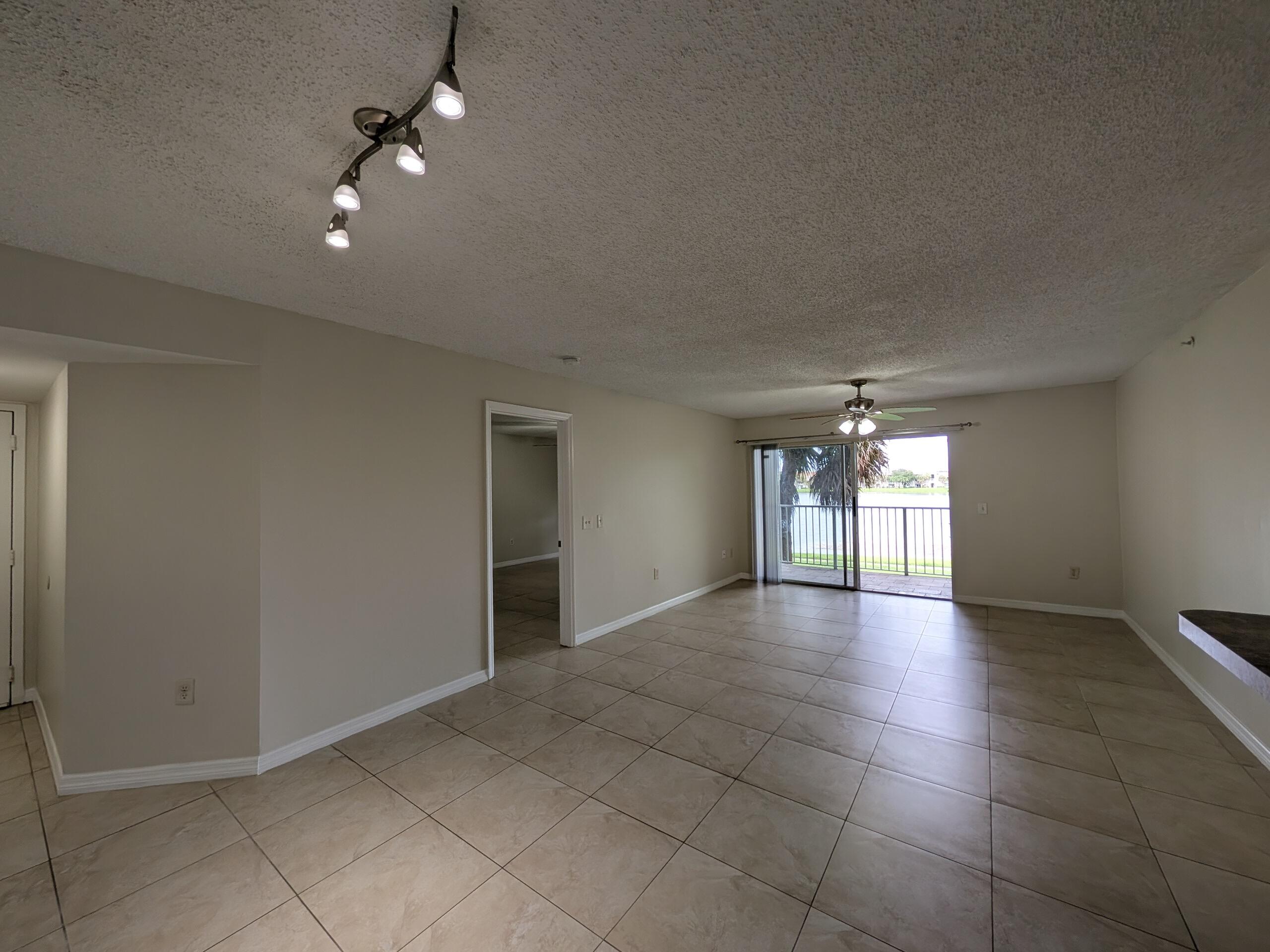 5011 Wiles Road, Unit 208 Coconut Creek, FL 33073 - Photo 3 of 23 1000014704