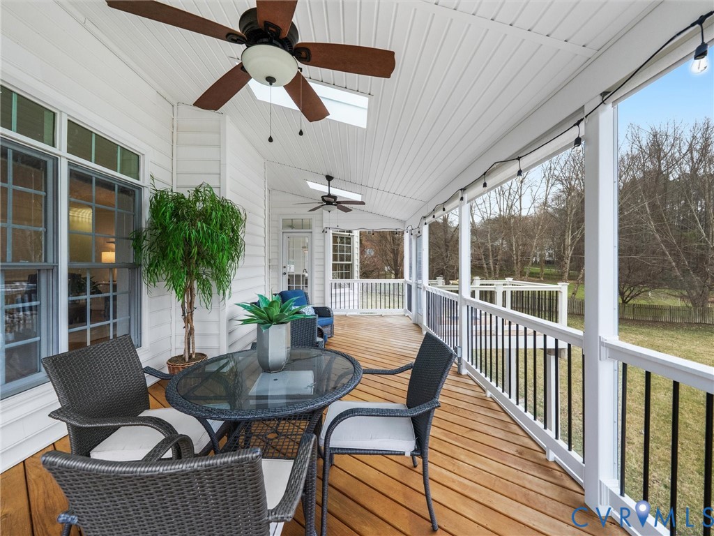14335 Lander Road Midlothian, VA 23113 - Photo 32 of 70 a outdoor space with patio the couches and a dining table with garden view