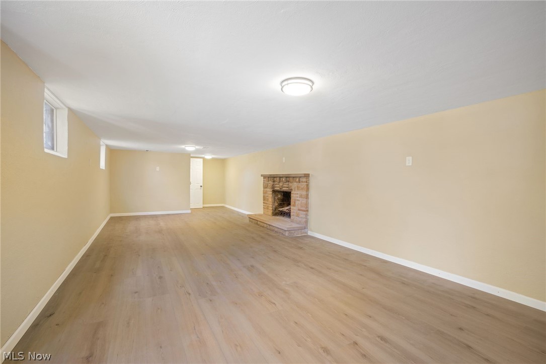 154 Winchester Road Akron, OH 44333 - Photo 23 of 26 Unfurnished living room featuring light wood-type flooring