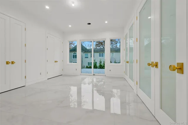 a view of a hallway with staircase