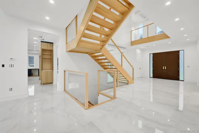 a view of room with window and hardwood floor