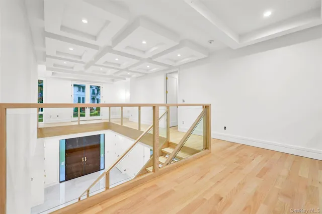 a living room with a fireplace and a flat screen tv