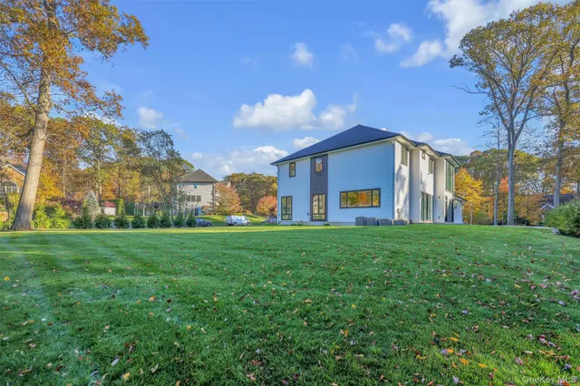 a view of a house with a back yard