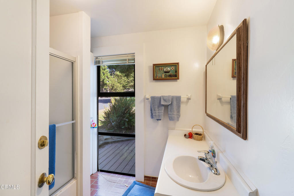 5420 Highway 1 Elk, CA 95432 - Photo 63 of 72 a bathroom with a sink and a mirror