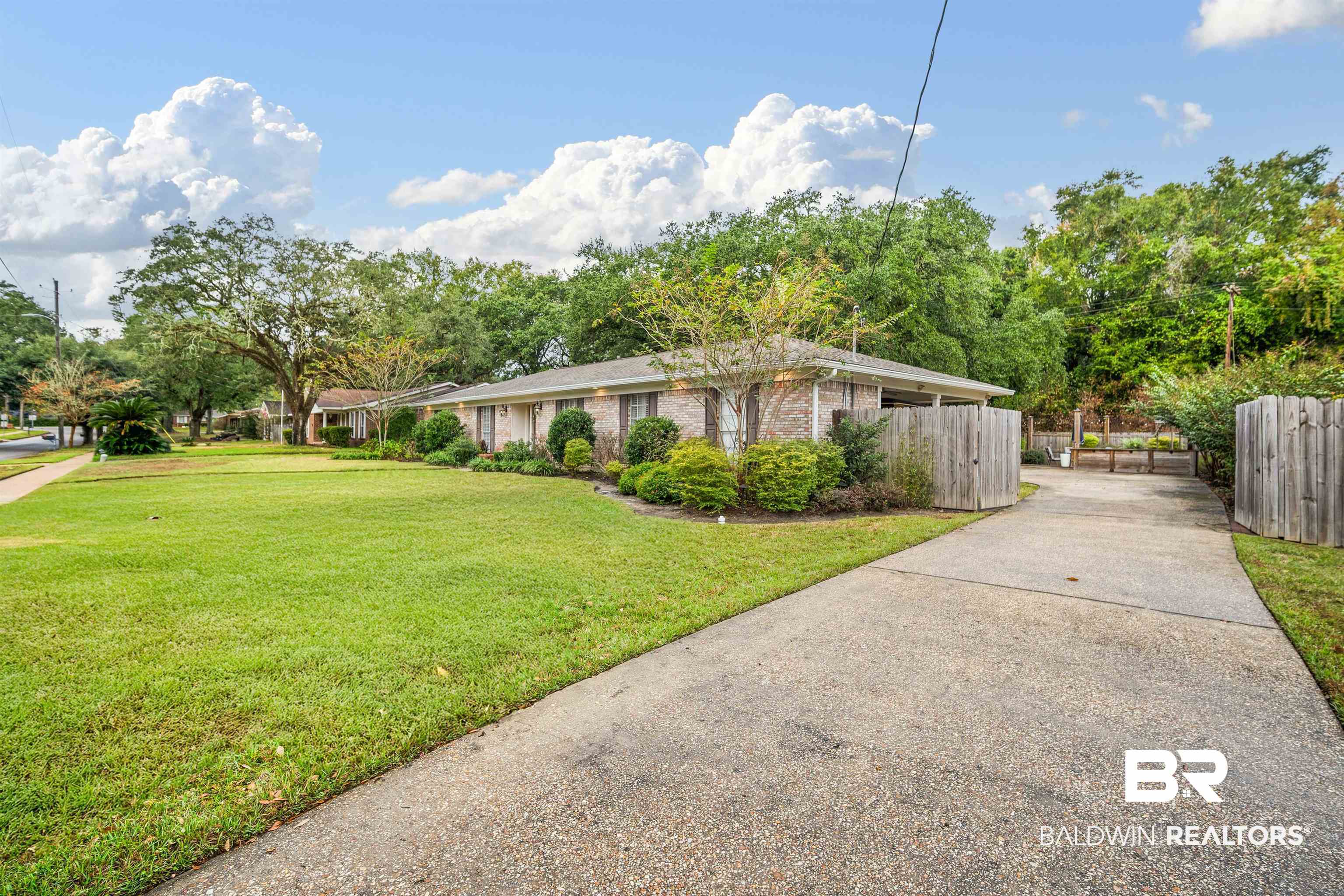 4228 Spring Valley Drive South Mobile, AL 36693 - Photo 3 of 31 Ranch-style home with a front lawn