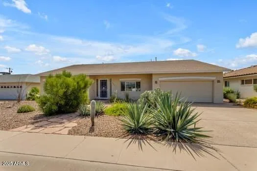 a view of a palm trees in front of a house