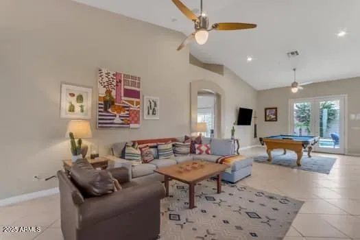 a large kitchen with a table and chairs