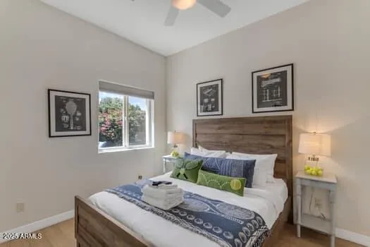 a bedroom with a bed and a couch