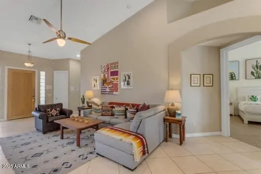 a bedroom with a bed and wall painting