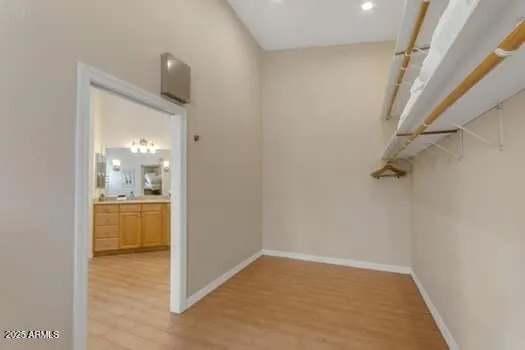 a bathroom with a sink vanity and a mirror