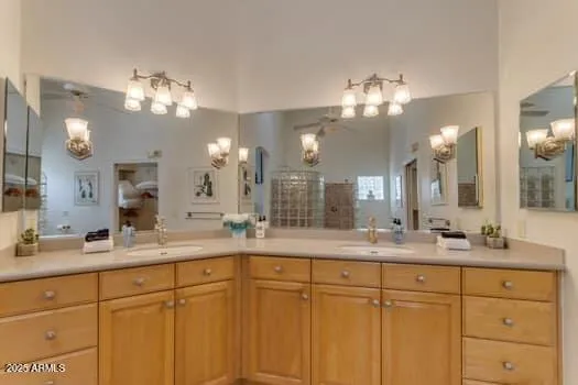 a kitchen with cabinets and wooden floor
