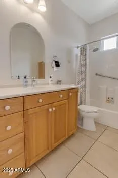 a view of a backyard with plants and swimming pool