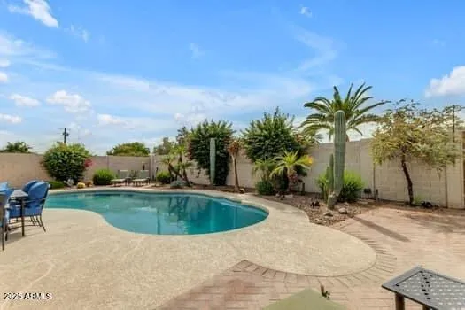 a view of a swimming pool with a sitting