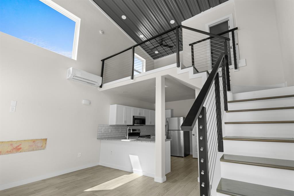 802 Old Wise Road, Unit 22 Bowie, TX 76230 - Photo 1 of 1 a view of entryway and kitchen