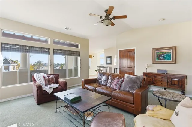 a kitchen with stainless steel appliances kitchen island granite countertop a stove and cabinets
