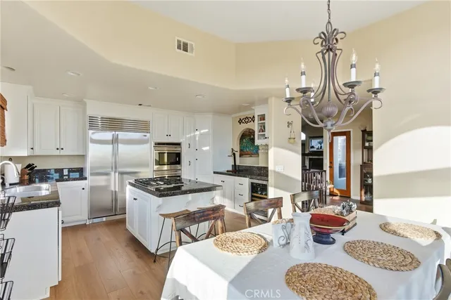 a bedroom with a bed and a desk