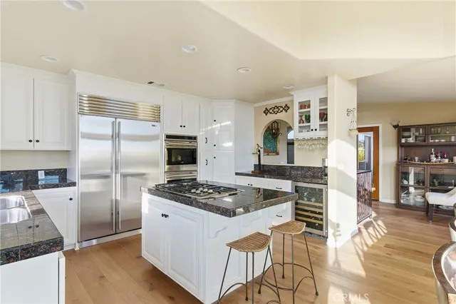 a bathroom with a shower and a sink