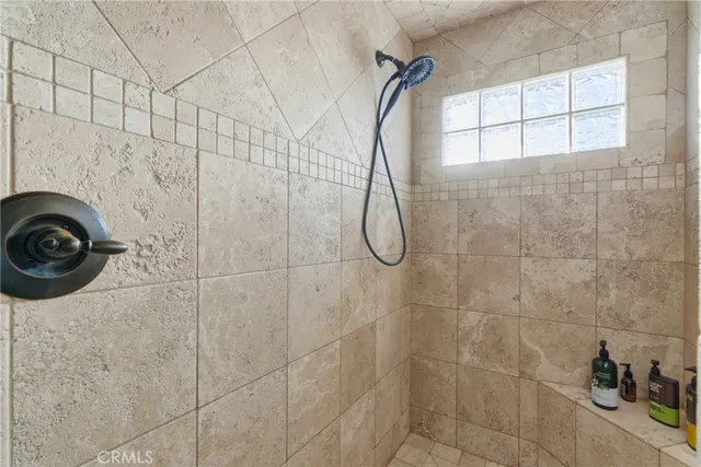 an aerial view of a residential apartment building with a yard