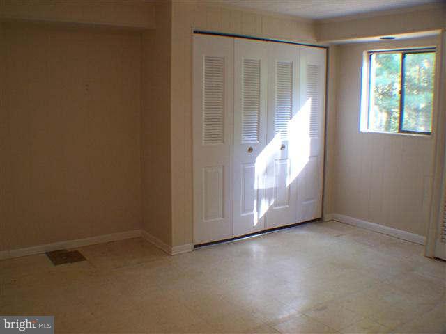 11807 Blue Spruce Road Reston, VA 20191 - Photo 29 of 30 a view of an empty room with a window
