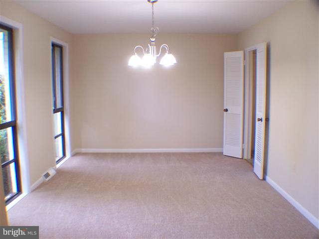 11807 Blue Spruce Road Reston, VA 20191 - Photo 4 of 30 a view of empty room with window